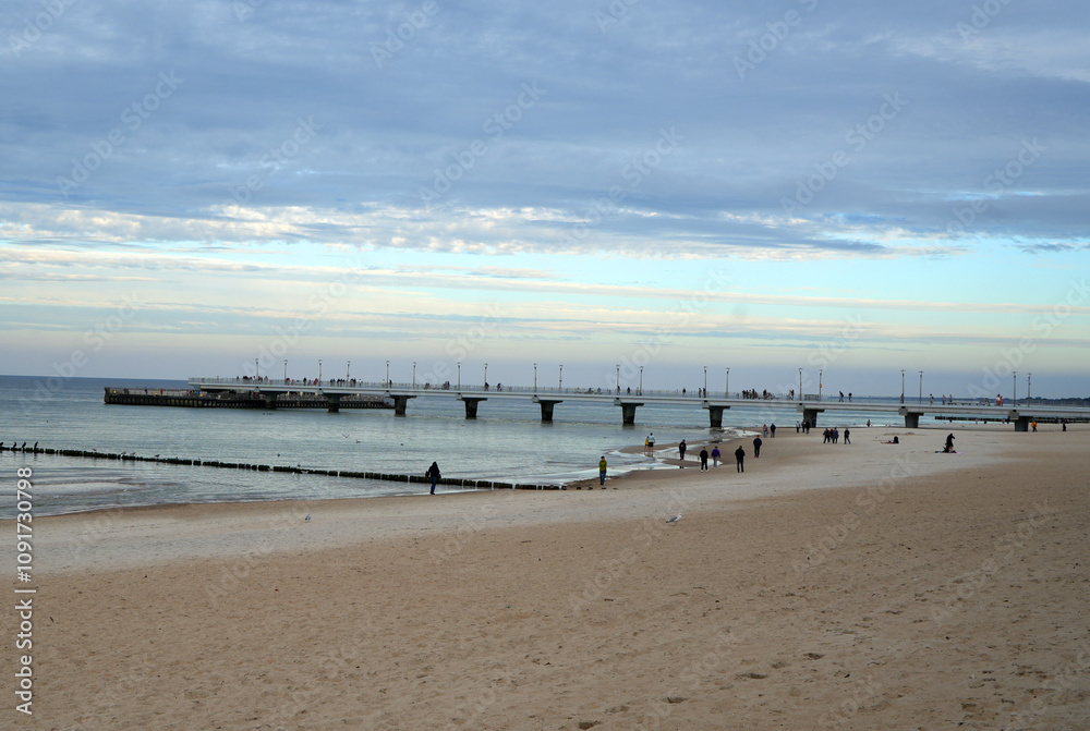 Kolobrzeg, Poland the sea brigde and pier and the beach in autumn