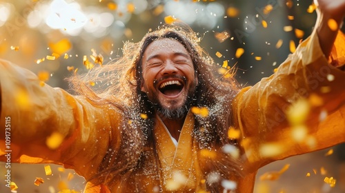 A long-haired man is seen jubilantly celebrating, surrounded by falling leaves, radiating a sense of joy and liberation in a vibrant autumn atmosphere.