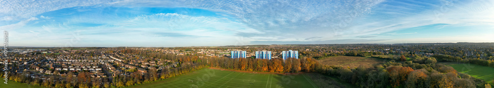 Fototapeta premium Aerial Panoramic View of Luton City During Orange Sunset Time