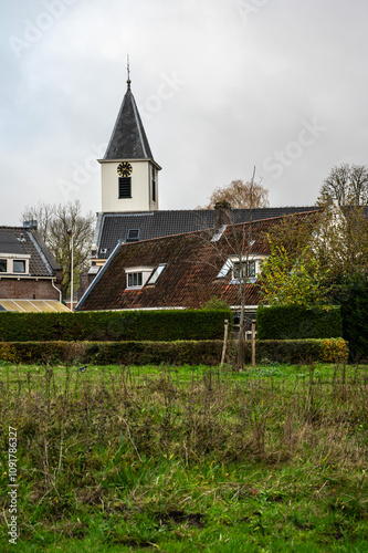 The Saint Peter church and green park in Amsterdam, The Netherlands photo