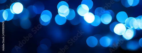 Abstract blue background with side bokeh and blur for holiday design for New Year, Christmas, Hannukah.