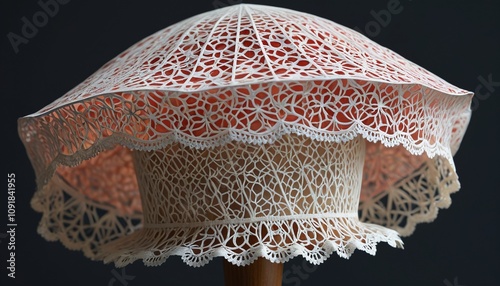 A bonnet made from delicate lace crafted entirely from edible rice paper, with an intricate design that looks like delicate filigree, displayed on a stand, Generative AI photo