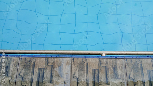 View of black tiles from a high angle on the swimming pool