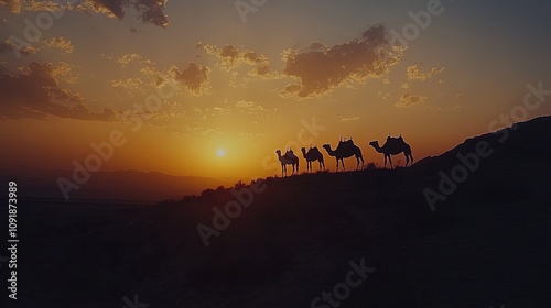 ARRAKESH - Marrakesh - MOROCCO - 10-20-2023: Silhouettes of camels at sunset in the Agafay desert, Morocco. photo