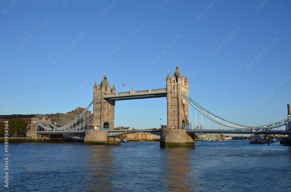Obraz premium London, England, United Kingdom - October 2024: Tower Bridge is a bascule, suspension bridge built between 1886 and 1894. One of the prominent symbols of the United Kingdom.