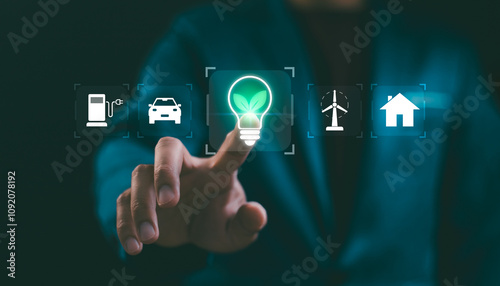 Concept of emphasizes sustainable innovation and carbon neutrality. Man touch screen Net Zero interface, by eco business icons, wind power, recycling, and electric vehicles, solar light, co2 reduce