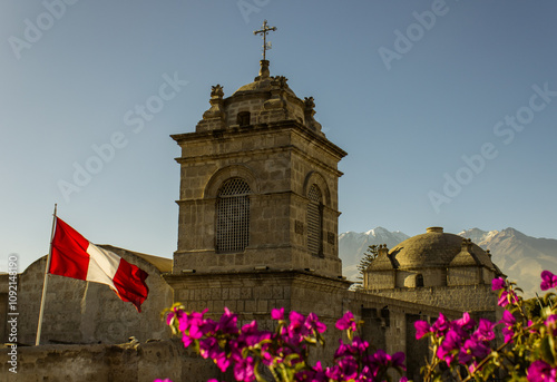 view of the exterior of the monastery of santa catalina with chachani in the background