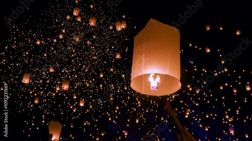 Releasing lanterns at the Yi Peng Festival in Chiang Mai.