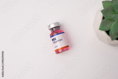 a liquid vitamin b12 lying on the clinic table. health and medical concepts