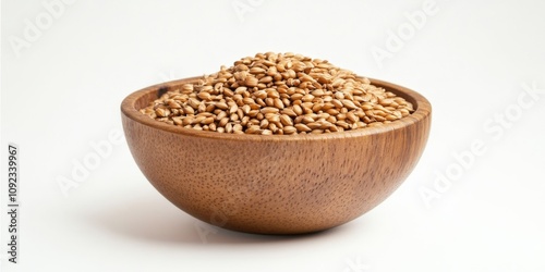 Wooden bowl containing onion seeds presented against a clean white background, showcasing the natural texture and color of the onion seeds in this decorative wooden bowl.