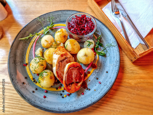 Obraz na płótnie Roulade with dumplings and fried beetroots. w salonie