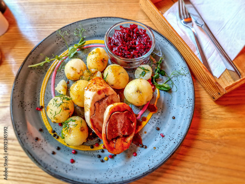 Obraz na płótnie Roulade with dumplings and fried beetroots. w salonie