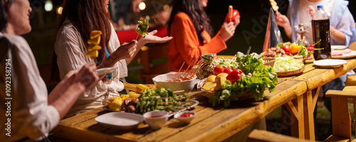 Photography Group of young Asian friends enjoying dinner party together Barbecue grilling, drinking beer, people, food, healthy fruits and vegetables, celebrating, lifestyle drinks