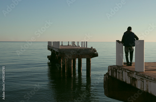 Принти на полотні Man in front of a broken bridge