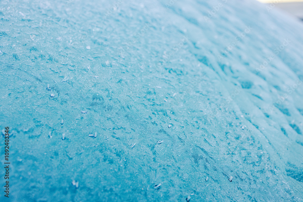 Obraz premium Close up of flat surface covered with ice and frost on cold winter weather.