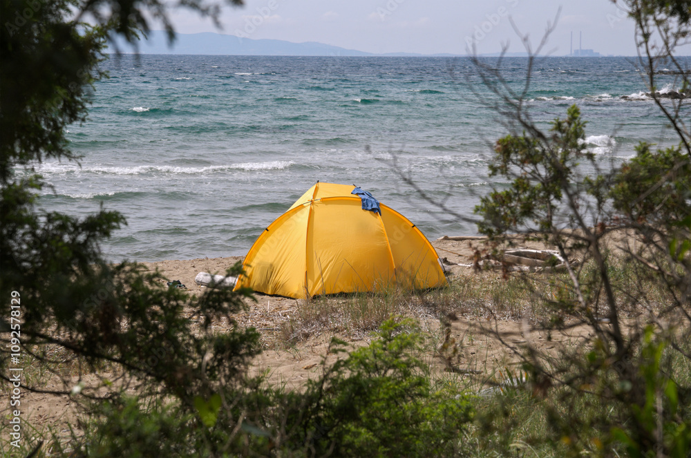 yellow camping tent on beach yellow camping tent on beach