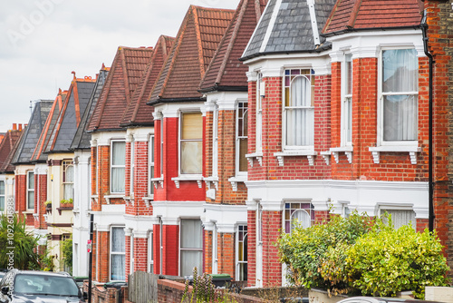 Row of traditional English terraced houses in Harringay, London, UK photo