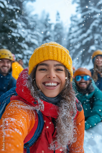 Smiling woman taking selfie with friends during snowfall in winter forest. Perfect holiday activity exploring scenic landscape.
