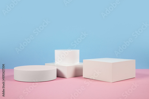 Blue and pink background for product presentation. Empty podiums. Mockup