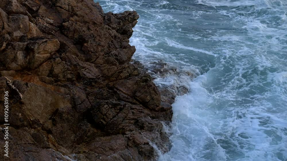 Wave crash against rocks. Super Slow motion 4K Wave crash against rocks. Super Slow motion 4K