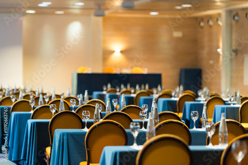 Elegant conference room with neatly arranged tables and chairs
