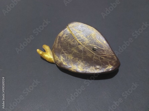 ancient designed soap dish handmade clay with black background