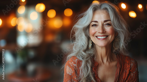 Smiling woman with long gray hair enjoying a warm and inviting atmosphere in a cozy cafe at dusk. Generative AI