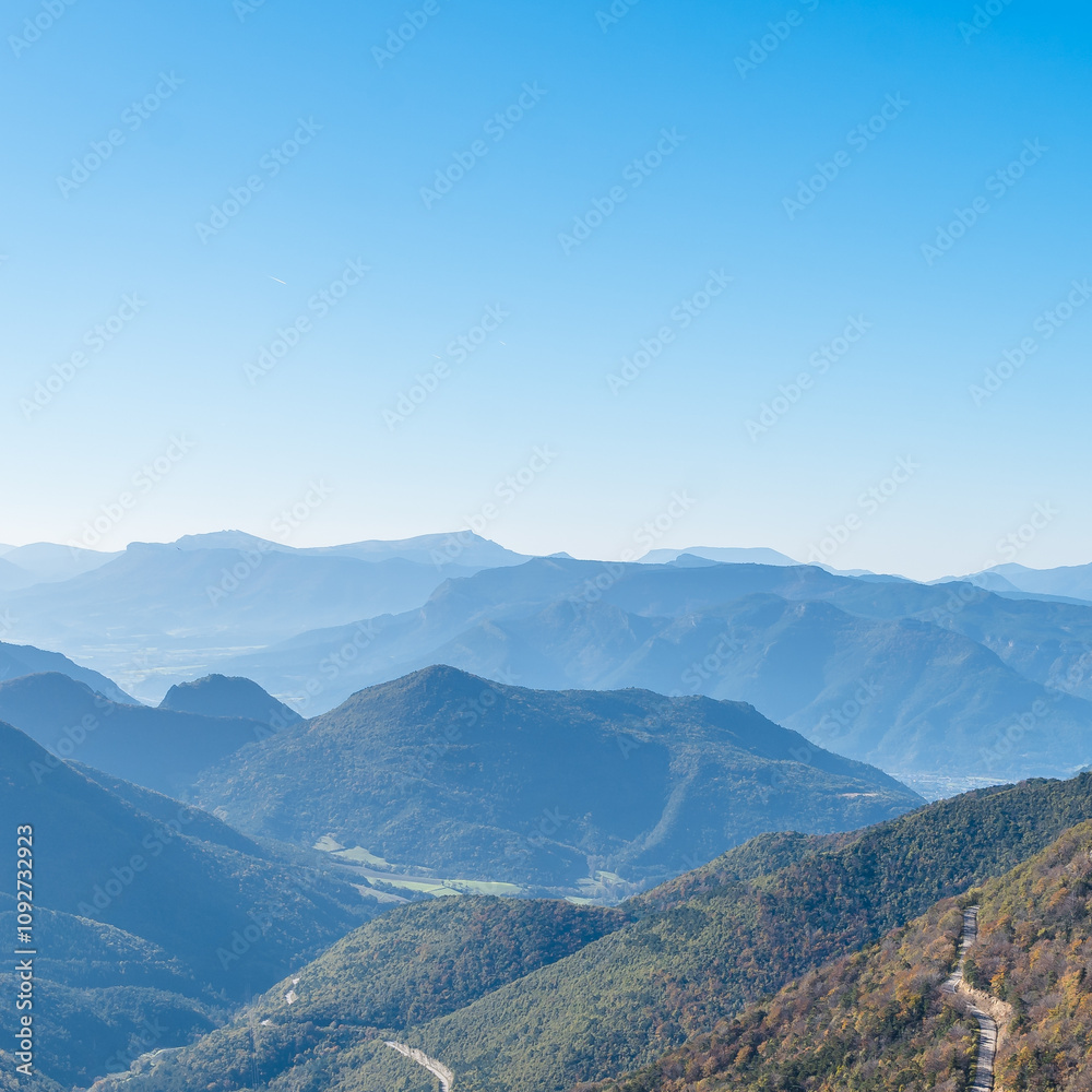 Majestic Mountain Landscape in the Vercors with Blue Sky and Space for Text Majestic Mountain Landscape in the Vercors with Blue Sky and Space for Text