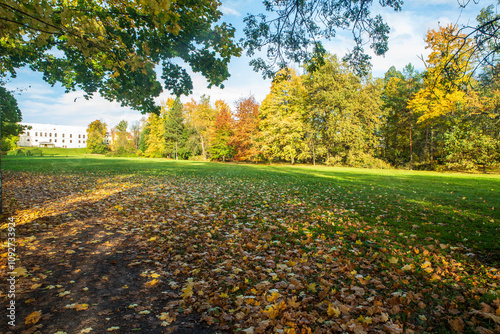 Autumn Park Bozeny Nemcove with Frystat chateau on the background in Karvina city in Czech republic photo