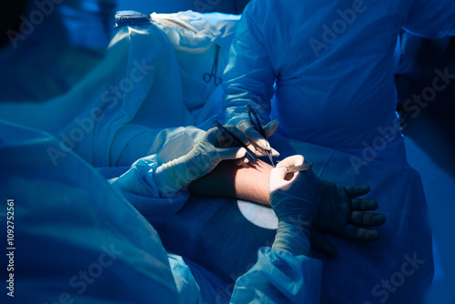 Surgical Precision: Surgeons Performing Delicate Procedure in Operating Room