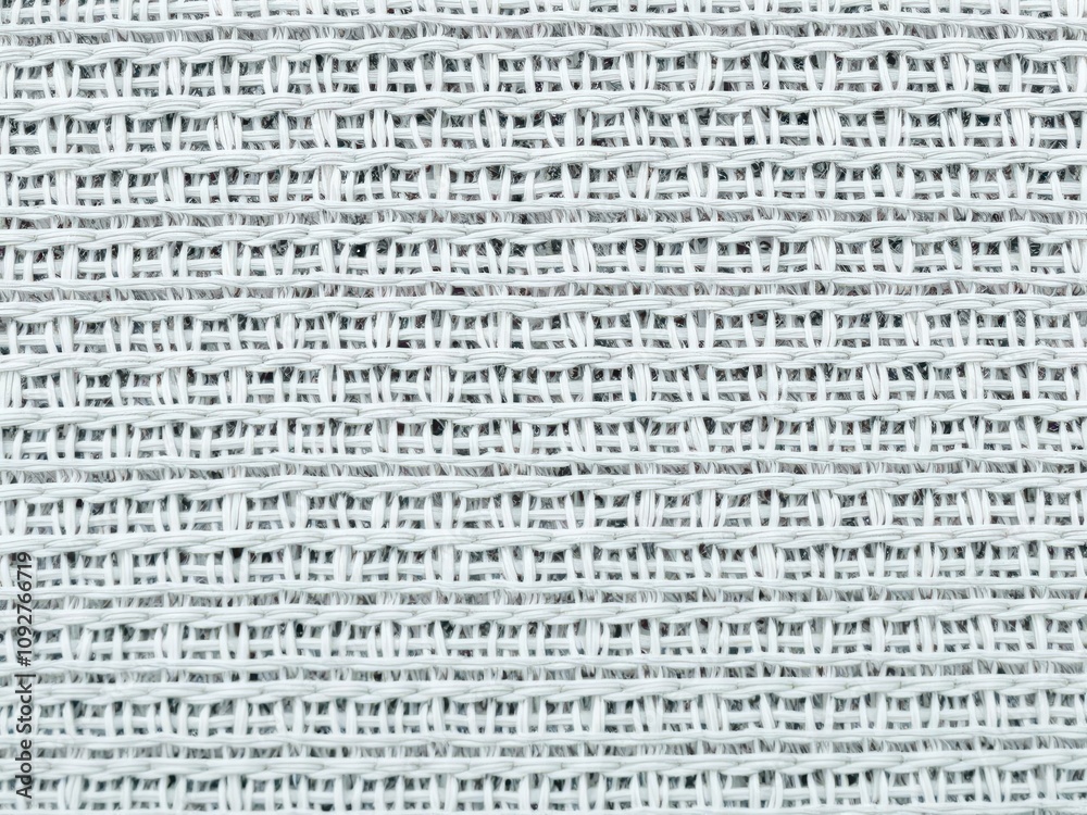 Obraz premium Close-up of a soft, woven patterned fabric, touch