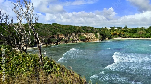 Bay in Saint Felix next to petit Havre, le Gosier, guadeloupe.  Sea waves and cliffs landscape.  photo