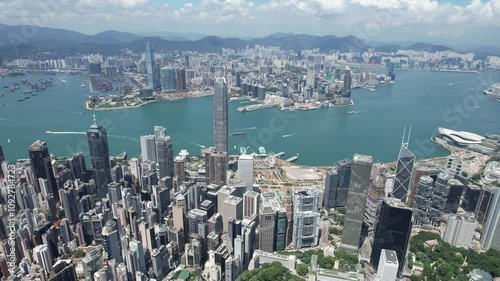 Aerial drone skyview of Hong Kong West Kowloon Victoria Harbour Financial Tsim Sha Tsui Hung Hom Central Admiralty Wan Chai Happy Valley Tai Hang Causeway Bay Tai Hang
 photo