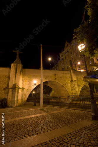 Bridge of St. John across the river Nysa. Desert night city in Klodzko, Poland