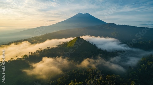 the view of the mountain is very beautiful from the drone. the natural scenery of the mountain shrouded in dazzling clouds is very nice and peaceful 