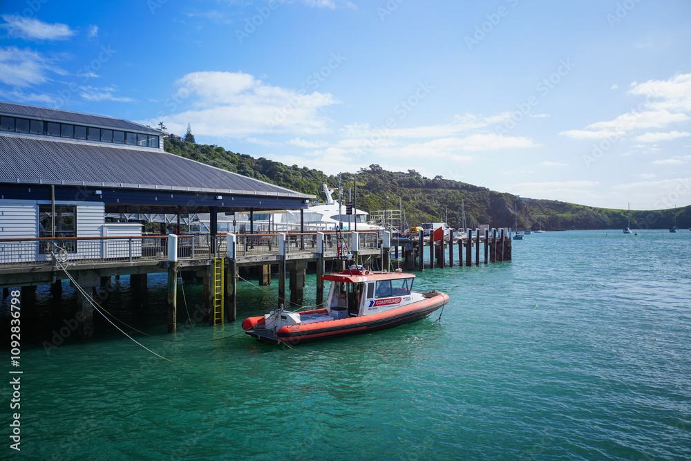 Tranquil Harbor View with Boat and Dock Tranquil Harbor View with Boat and Dock