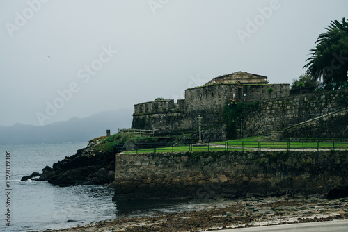 Cape and Fisterra Lighthouse Chemin de Saint Jacques, spain - nov, 2021 photo