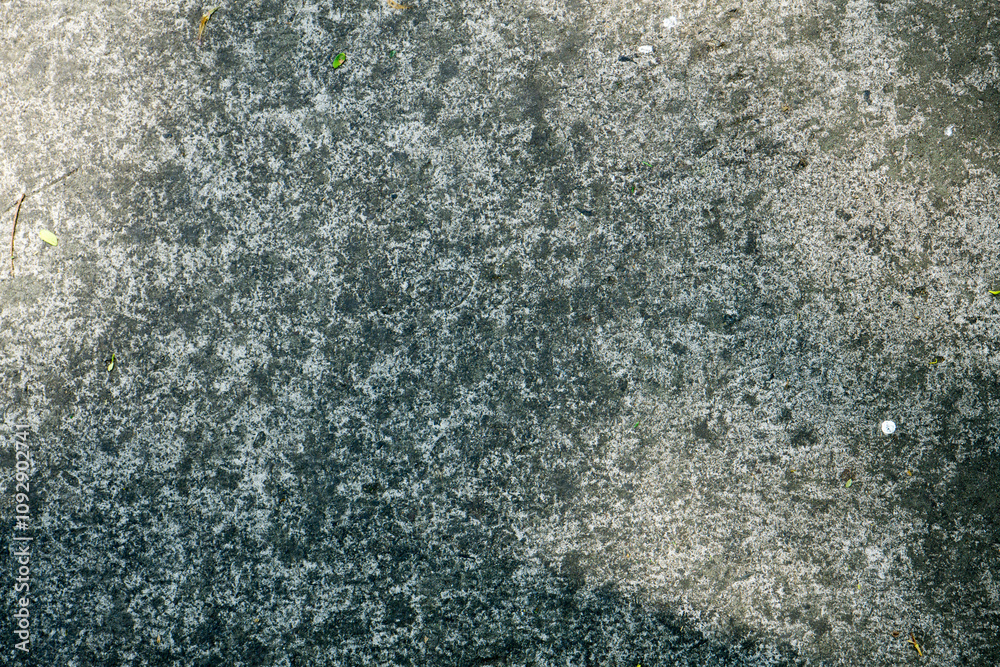 A close up shot of a concrete background, showcasing its textured surface. The neutral tones and rough texture create a modern, industrial aesthetic A close up shot of a concrete background, showcasing its textured surface. The neutral tones and rough texture create a modern, industrial aesthetic