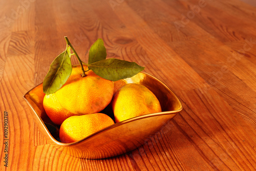 Ripe  orange tangerines in bowl