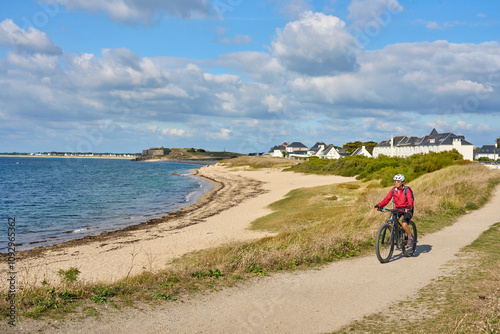 active senior woman cycling...