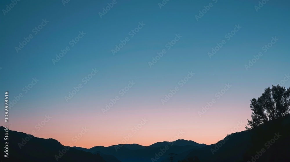 A serene sunset over rolling mountains, showcasing a tranquil gradient of colors in the sky. A serene sunset over rolling mountains, showcasing a tranquil gradient of colors in the sky.
