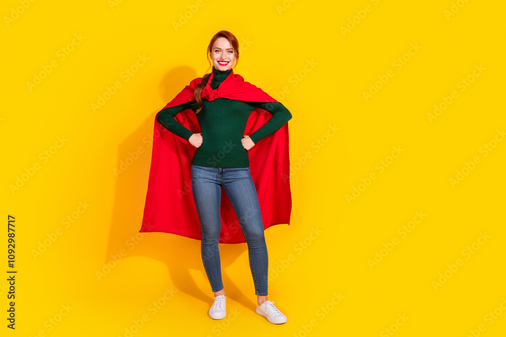 Full length photo of charming positive woman wear green turtleneck red cape smiling empty space isolated yellow color background Full length photo of charming positive woman wear green turtleneck red cape smiling empty space isolated yellow color background