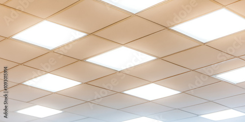 Ceiling of production room with panel lighting, rows of industrial ceiling luminaires, lighting