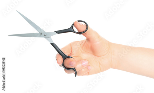Woman hand holds Office Scissors, isolated on transparent background, stationery concept