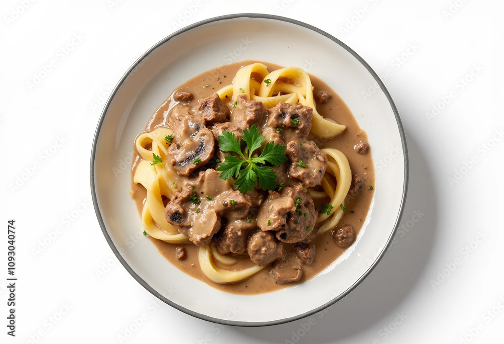 Top view of creamy beef stroganoff served over egg noodles in a white bowl, garnished with fresh parsley, rich mushroom sauce, and soft lighting on a clean white background