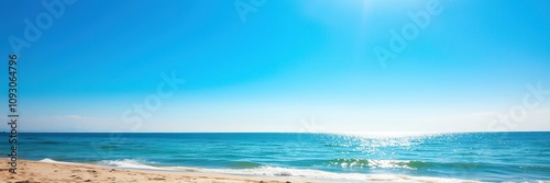 A tranquil moment at the beach with a clear blue sky and warm sunlight, peaceful atmosphere, warm sunlight, calm sea