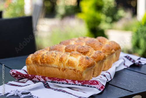 Home made traditional Romanian bread. Close up photo with bread and slices of bread cooked in Moldova region from Romania. photo