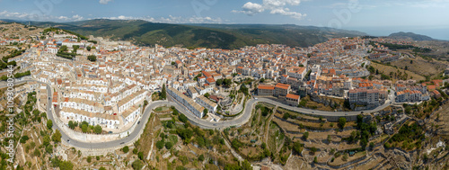 Panoramic aerial view of the town of Monte Sant'Angelo, in the province of Foggia, Apulia. It is a typical village of Southern Italy located on Mount Gargano.