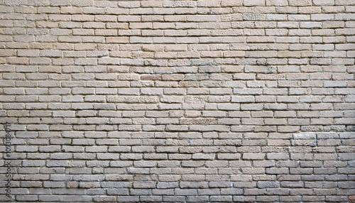 texture d'un mur ancien clair, avec une surface en briques colorées