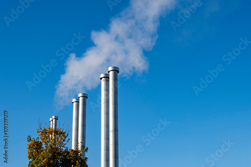 pipes white steam blue sky heating boiler heat Netherlands autumn